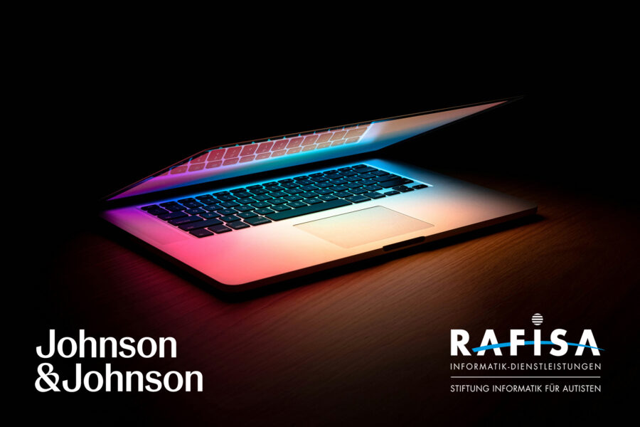 Ein Laptop, welcher zur Hälfte aufgeklappt ist.